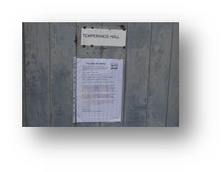 An image showing the Planning Notice pinned to the front door of Temperance Hall