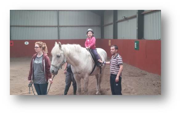 An August trip to Acorn Farm where Emily gets to grips with a very friendly horse