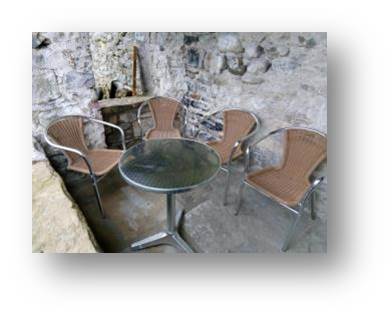 The seating area needs a lot of work, but we can still sit out and enjoy what we have for now.