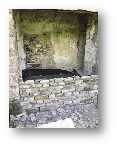 With the rear wall rebuilt on proper foundations the inner floor can be levelled.