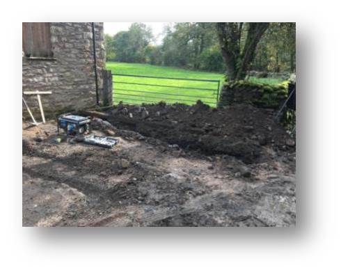Digging out the trench for the new mains water line