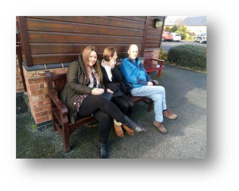 Rachel Margaret and Gary chilling on a bench