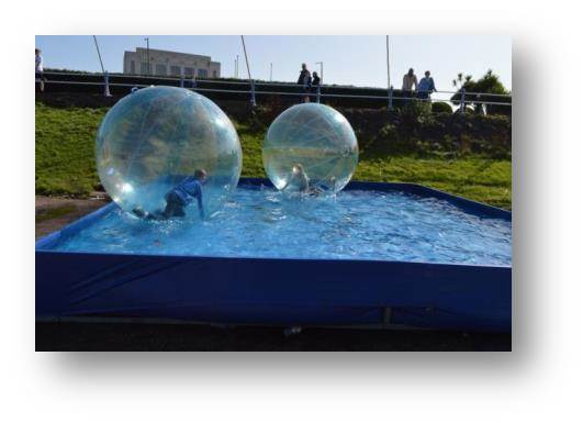 The kids Zorbing on Morecombe Prom