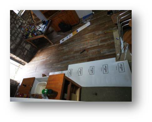 The new flooring starts to go down