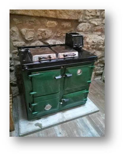 Rayburn cooker moved into position at Temperance Hall