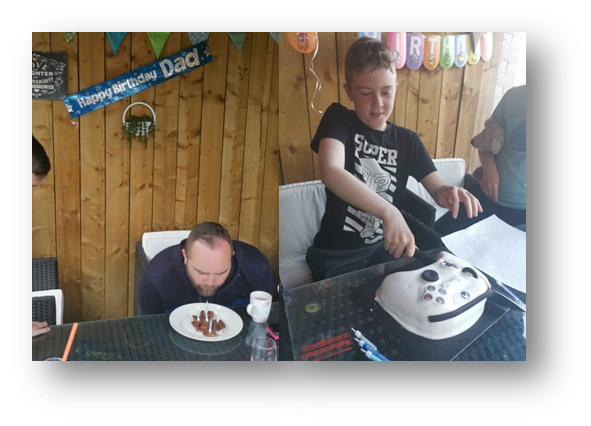 Andy blowing out his Birthday Brownie