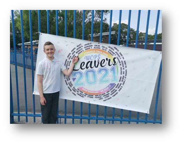 Graduation day as Adam leaves Primary School behind for the last time.